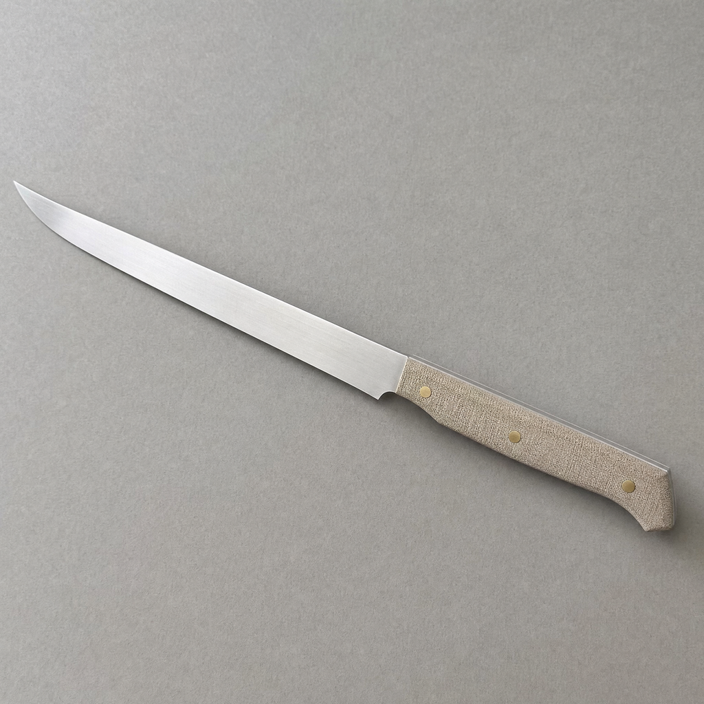 The Slicer 240 seen from above: a long narrow satin stainless blade with a natural linen micarta handle on three brass pins.