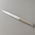 The Slicer 240 seen from above: a long narrow satin stainless blade with a natural linen micarta handle on three brass pins.