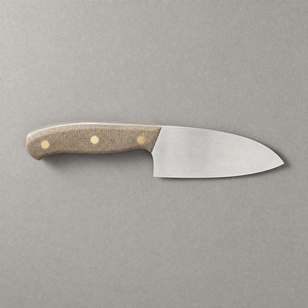The Chef 165 seen from above: a short deep 165 mm satin stainless blade with a natural linen micarta handle on three brass pins.
