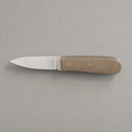 The Paring 90 seen from above: a short 90 mm satin stainless blade with a natural linen micarta handle on three brass pins.